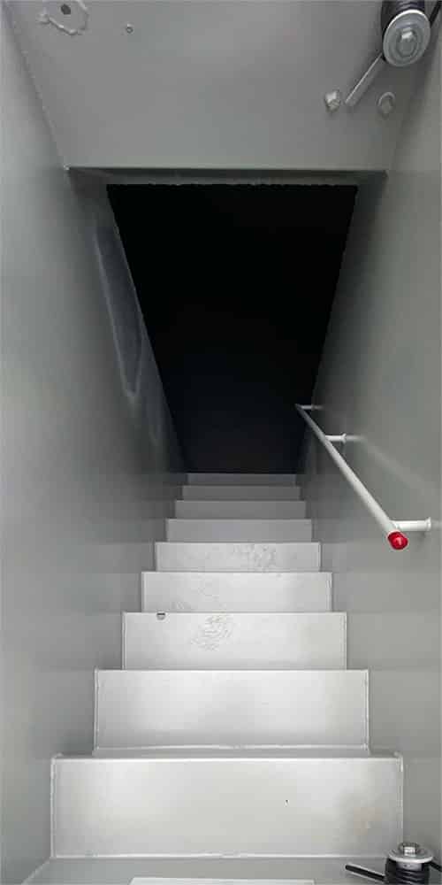 Stairs leading down into the Estate underground shelter