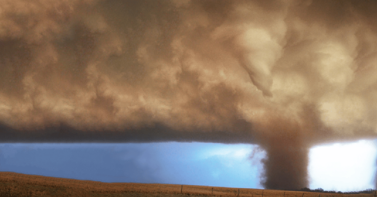 An image of a tornado that form from the ground and extended up to the cloud
