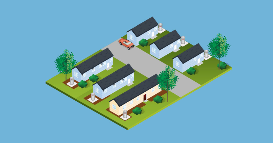 An illustration of a mobile home park, each home has an external above-ground tornado shelter.
