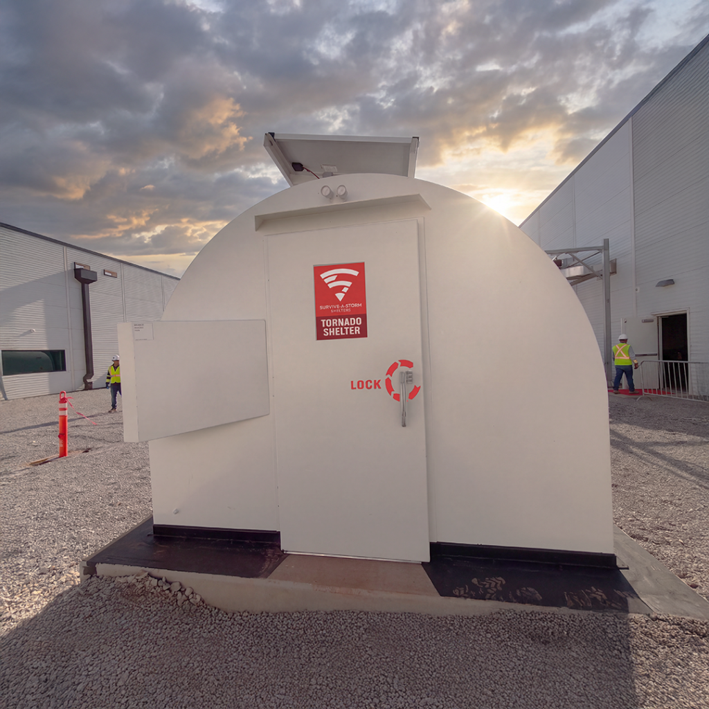 commercial tornado shelter warehouse Commercial tornado shelter installed outside an industrial facility