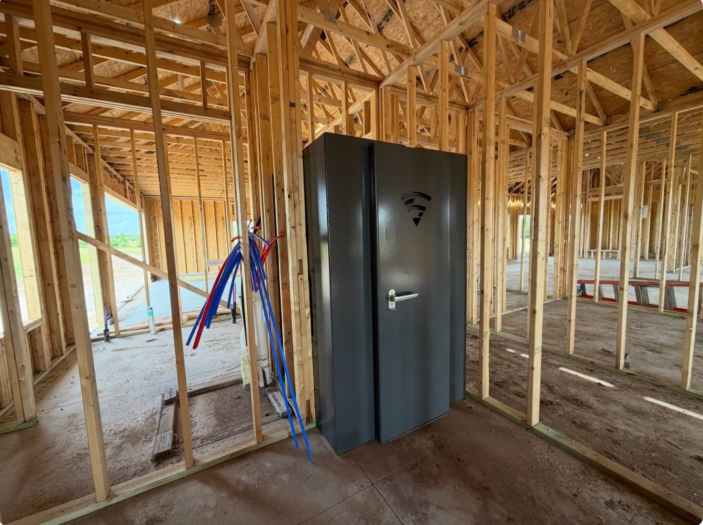 Above-ground tornado shelter installed during new home construction