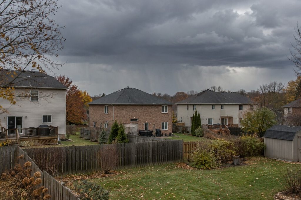 Fall storm clouds over a residential neighborhood during tornado season.